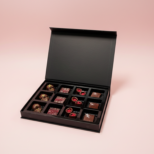 Goodio Valentine's day chocolate pralines selection on a pink background